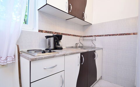 Umag 107: Room, Property, Furniture, Kitchen, House, Interior Design, Material Property, Real Estate, Cabinetry, Architecture