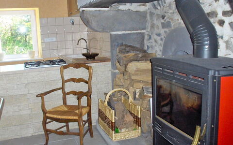 O'Petit Bonheur: Hearth, Wood-Burning Stove, Fireplace, Room, Stove, Heat, Masonry Oven, Major Appliance, Home Appliance, Furniture