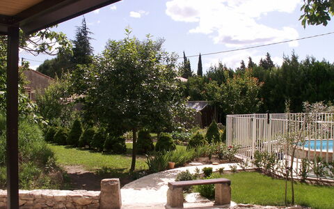 Haider: Property, Yard, Tree, Garden, House, Backyard, Botany, Home, Real Estate, Landscaping