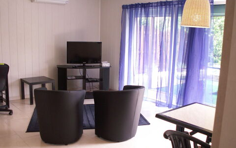 Haider: Room, Property, Furniture, Interior Design, Curtain, Floor, Table, Building, Textile, Window Treatment