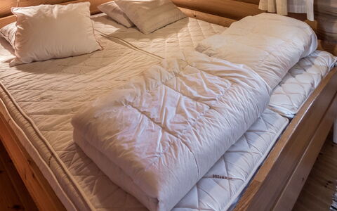 Ruka-Kitkan Kuukkeli: Wood, Furniture, Flooring, Interior Design, Floor, Bed, Bedroom, Linens, Wood Stain, Room