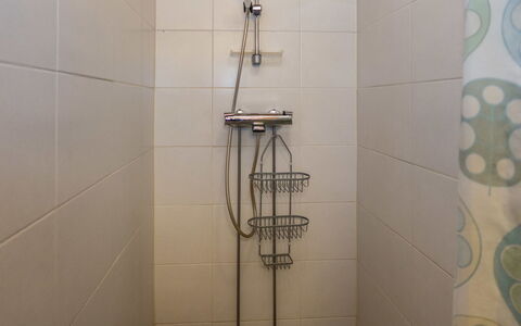Ruka-Kitkan Kuukkeli: Bathroom, Shower Head, Plumbing Fixture, Flooring, Shower, Shower Bar, Plumbing, Floor, Shower Panel, Tile
