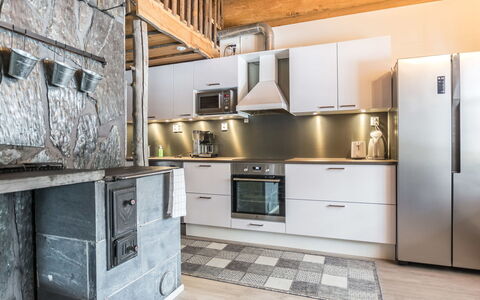 Juurakkopirtti: Kitchen, Wood, Major Appliance, Kitchen Appliance, Flooring, Countertop, Interior Design, Ceiling, Furniture, Home Appliance