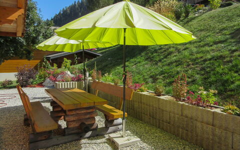 Helene: Plant, Property, Umbrella, Table, Shade, Tree, Outdoor Furniture, Botany, Outdoor Bench, Grass