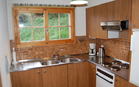 Chalet Enfin: Countertop, Room, Kitchen, Property, Cabinetry, Furniture, Sink, Building, House, Hardwood