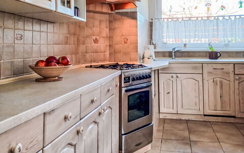Bursztynowa: Kitchen, Countertop, Cabinetry, Kitchen Appliance, Wood, Flooring, Major Appliance, Interior Design, Kitchen Sink, Floor
