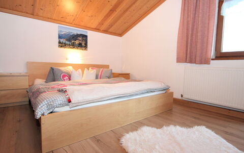 Gruber: Furniture, Comfort, Window, Wood, Pillow, Bed Frame, Interior Design, Architecture, Floor, Building
