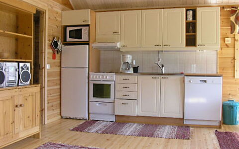 Iso Marina: Flooring, Wood, Floor, Interior Design, Ceiling, Furniture, Kitchen, Major Appliance, Room, Cabinetry