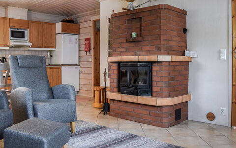 Ahonlaita: Furniture, Wood, Flooring, Interior Design, Room, Floor, Living Room, Hardwood, Wood Stain, Chair