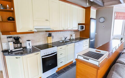 Rukan Taikavuosselin Helmi 8 a: Kitchen Appliance, Kitchen, Cabinetry, Countertop, Furniture, Major Appliance, Flooring, Interior Design, Wood, Floor