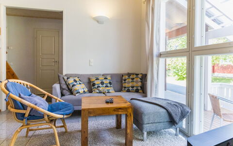 Tahko Ski Koivulantie: Furniture, Interior Design, Flooring, Floor, Couch, Wood, Room, Living Room, Ceiling, Chair