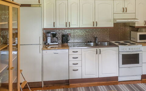 Ellilä: Kitchen, Kitchen Appliance, Countertop, Major Appliance, Cabinetry, Flooring, Furniture, Wood, Kitchen Sink, Interior Design