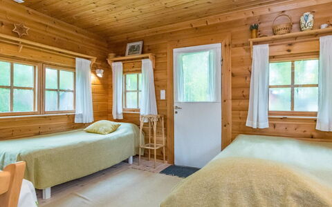 Tähdikki: Wood, Ceiling, Bedroom, House, Interior Design, Home, Floor, Cottage, Hardwood, Bed