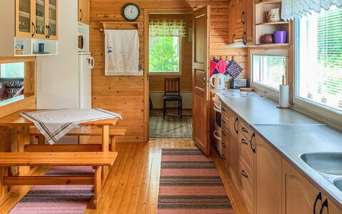 Majavanpesä: Wood, Interior Design, Flooring, Furniture, Floor, Kitchen, Countertop, Cabinetry, Room, Wood Stain