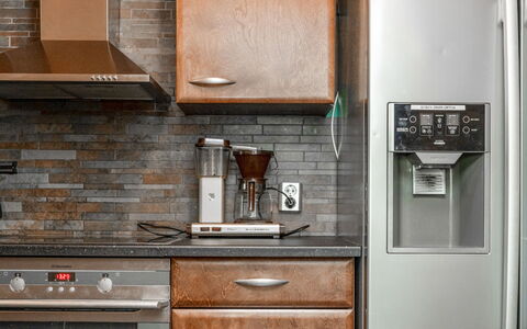 Villa Assi: Kitchen Appliance, Kitchen, Major Appliance, Home Appliance, Cabinetry, Countertop, Wood, Refrigerator, Flooring, Interior Design
