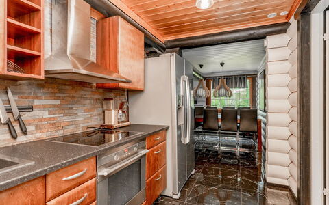Villa Assi: Wood, Kitchen, Furniture, Interior Design, Countertop, Flooring, Major Appliance, Ceiling, Floor, Kitchen Appliance