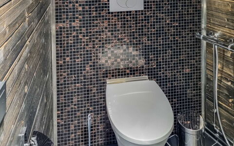 Minervahovi: Toilet Seat, Toilet, Plumbing Fixture, Flooring, Bathroom, Floor, Tile, Interior Design, Plumbing, Composite Material