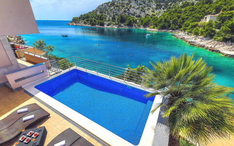 Villa Silvana: Property, Swimming Pool, Azure, Natural Landscape, Vacation, Bay, Resort, Real Estate, Caribbean, House