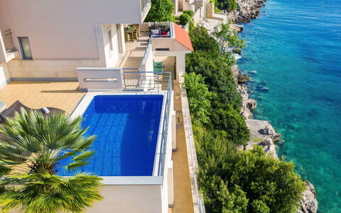 Villa Silvana: Property, Blue, Azure, Vacation, House, Real Estate, Sea, Building, Swimming Pool, Apartment