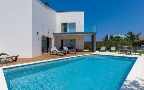Lana: Water, Property, Sky, Plant, Swimming Pool, Azure, Blue, Building, Shade, Chair