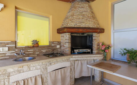 Licardo: Property, Furniture, Cabinetry, Countertop, Table, Plant, Wood, Interior Design, Lighting, Kitchen