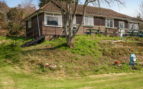 Inverness 101: Sky, Plant, Window, Property, Building, Tree, Natural Landscape, Land Lot, House, Vegetation