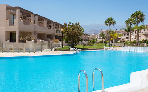 La Tejita: Water, Sky, Swimming Pool, Building, Azure, Plant, Tree, Outdoor Furniture, Condominium, Seaside Resort