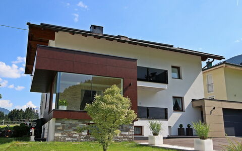 Fabian: Sky, Plant, Building, Cloud, Window, Shade, Tree, Land Lot, Urban Design, Residential Area