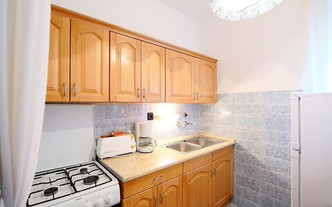 Daisy 2: Property, Room, Cabinetry, Kitchen, Furniture, Countertop, Yellow, Interior Design, Building, House