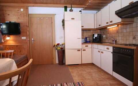 Aschau im Zillertal 320: Room, Property, Furniture, Countertop, Building, Cabinetry, Kitchen, Floor, Interior Design, House