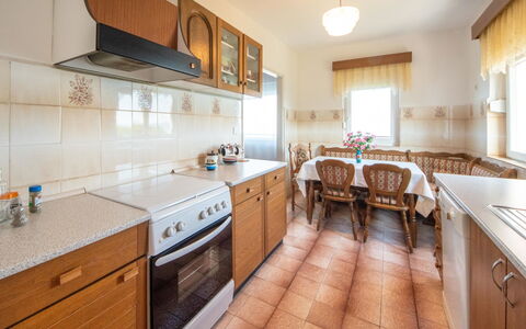 Josip: Cabinetry, Countertop, Window, Kitchen, Wood, Kitchen Stove, Lighting, Kitchen Appliance, Interior Design, Drawer