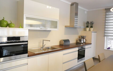 Les Terrasses du Lac: Room, Countertop, Furniture, Property, Kitchen, Cabinetry, Interior Design, Building, Kitchen Stove, House