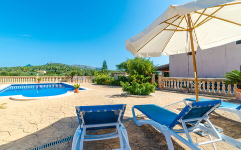 Can Josepot: Sky, Plant, Furniture, Water, Azure, Chair, Swimming Pool, Outdoor Furniture, Shade, Tree