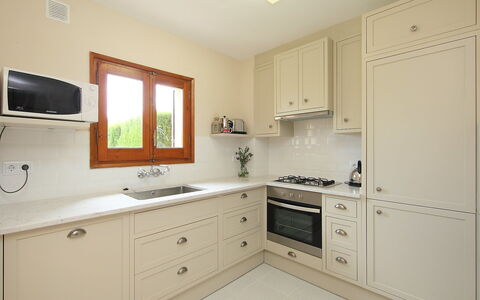 Mas Rovira 8: Room, Property, Furniture, Cabinetry, Kitchen, Interior Design, Countertop, Yellow, Building, House