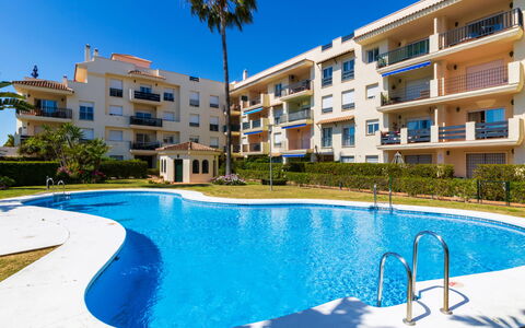 Lorcrimar: Water, Building, Plant, Sky, Daytime, Property, Window, Blue, Tree, Azure