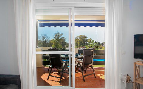 Lorcrimar: Interior Design, Glass, Chair, Window Treatment, Window Covering, Shade, Balcony, Eco Hotel, Wood Stain, Curtain
