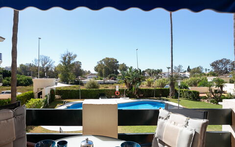 Lorcrimar: Outdoor Furniture, Furniture, Shade, Swimming Pool, Chair, Outdoor Table, Landscaping, Garden, Resort