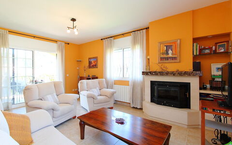 Marina: Living Room, Room, Property, Furniture, Interior Design, Building, Orange, House, Table, Floor