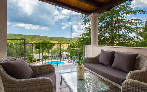Anka: Sky, Plant, Furniture, Cloud, Property, Couch, Table, Azure, Nature, Shade
