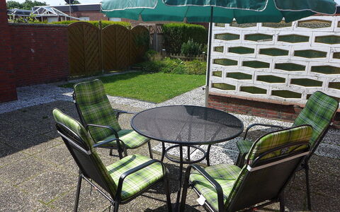 Sonnenschein: Furniture, Property, Chair, Outdoor Table, Patio, Outdoor Furniture, Table, Yard, Umbrella, Backyard