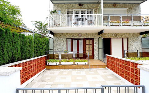 Gladiols: Building, Window, House, Door, Plant, Porch, Wood, Facade, Residential Area, Real Estate