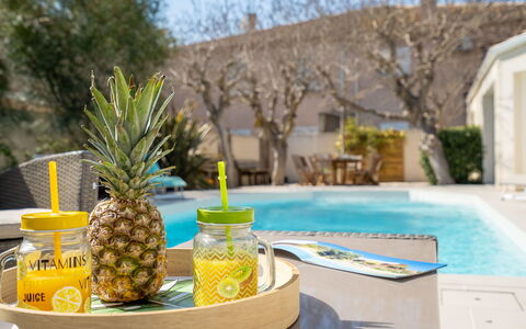 Villa du Littoral: Water, Table, Property, Plant, Sky, Azure, Building, Fruit