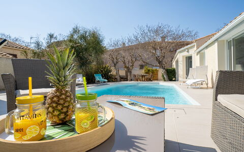 Villa du Littoral: Plant, Property, Sky, Water, Azure, Building, Window, Swimming Pool, Outdoor Furniture