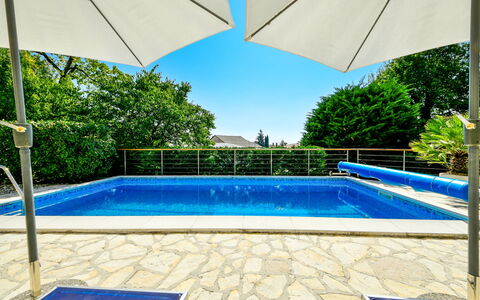 Lucija: Water, Property, Building, Plant, Swimming Pool, Blue, Azure, Nature, Sky, Umbrella