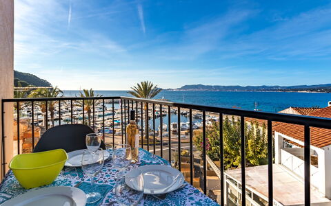 La Corniche: Sky, Cloud, Water, Furniture, Building, Property, Tableware, Blue, Seaside Resort, Table