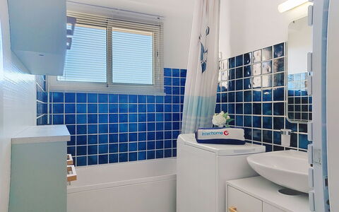 Le Drakar: Blue, Wall, Plumbing Fixture, Interior Design, Flooring, Bathroom, Floor, Plumbing, Tile, Room