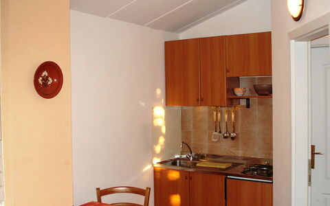 Novi: Room, Property, Furniture, Orange, Interior Design, Building, House, Floor, Real Estate, Kitchen