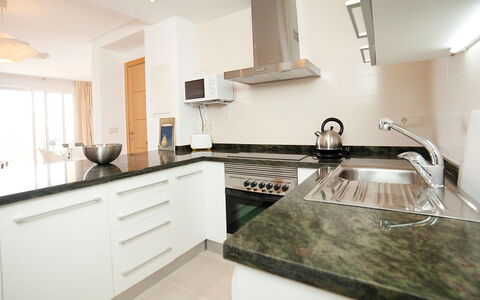 Altea 49: Countertop, Property, Room, Sink, Kitchen, Interior Design, Furniture, Floor, Cabinetry, Building