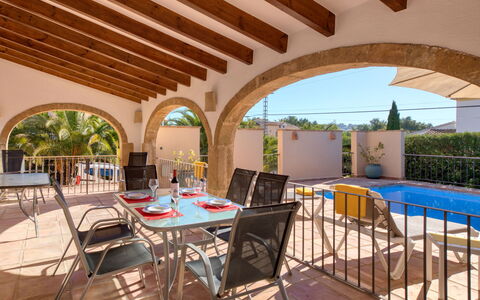 Pomeraj: Furniture, Property, Table, Chair, Sky, Shade, Lighting, Outdoor Furniture, Interior Design, Architecture