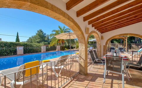 Pomeraj: Property, Furniture, Swimming Pool, Plant, Chair, Sky, Shade, Building, Outdoor Furniture, Tree